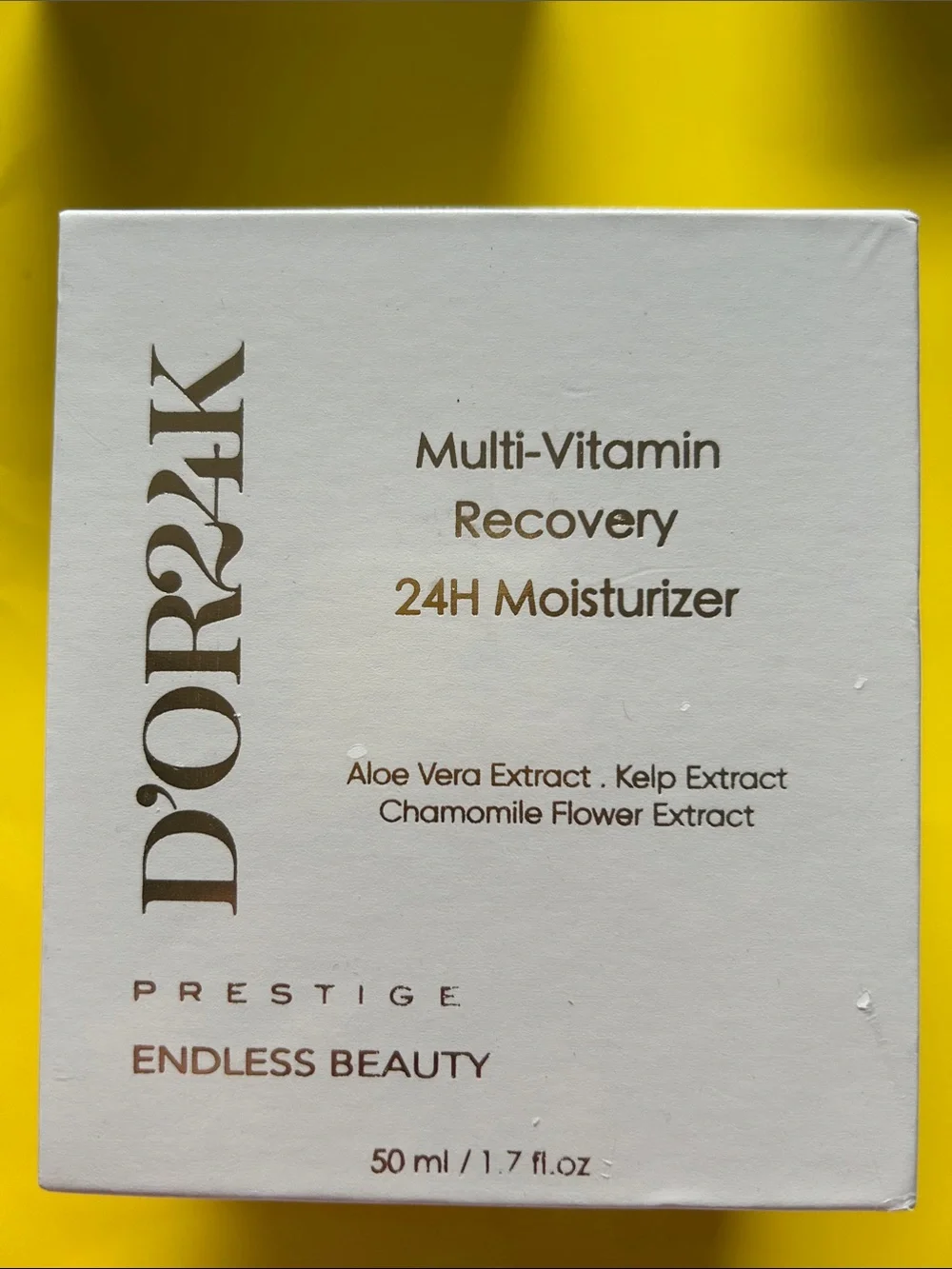 D'Or Skincare moisturizer set in cream, white and yellow packaging